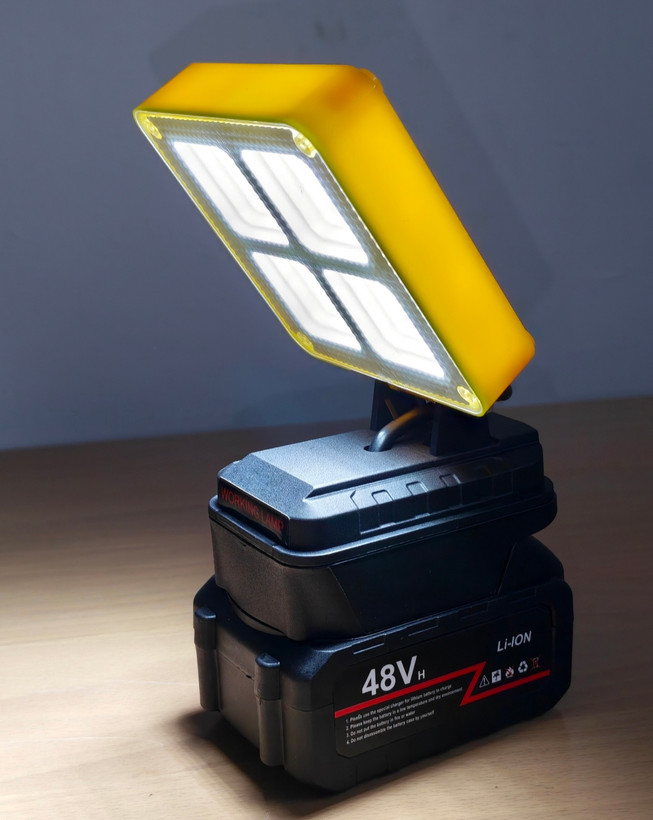 چراغ کمپ شارژی پروژکتور 4 شبکه باتری جداشونده مدل working lamp